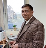 Dr. Ambuj Tripathi